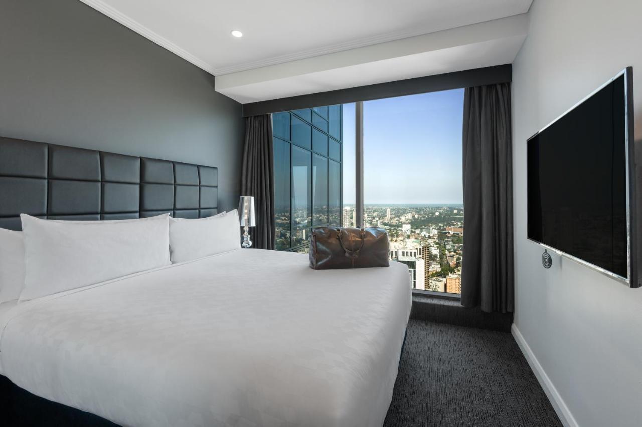 Meriton Suites World Tower, Sidney Exterior foto A bedroom at the hotel