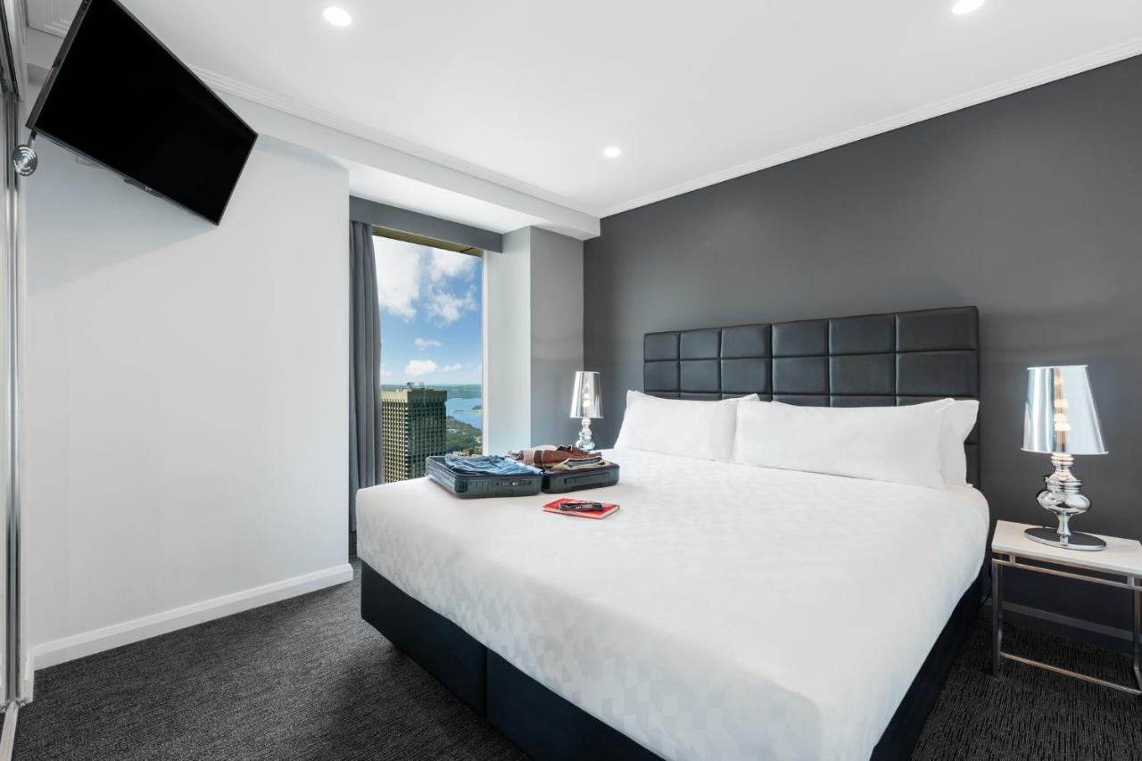 Meriton Suites World Tower, Sidney Exterior foto A bedroom at the hotel